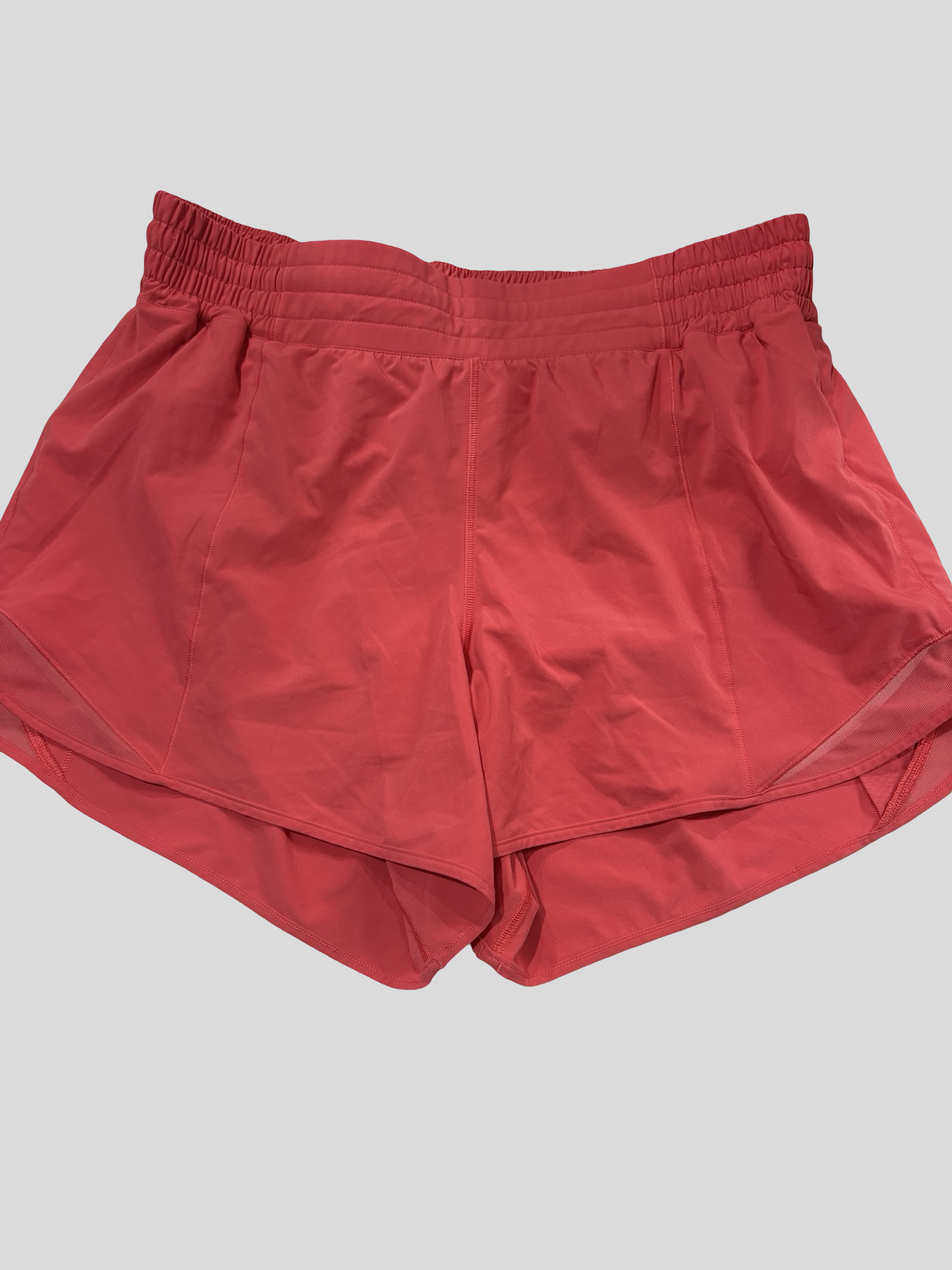 Women’s ( coral pink) large Lululemon shorts size 12