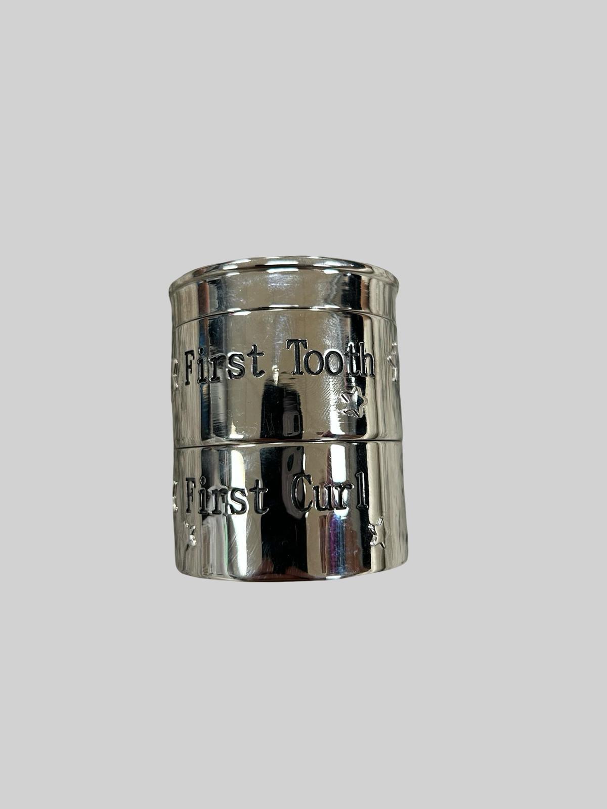 First tooth and curl container