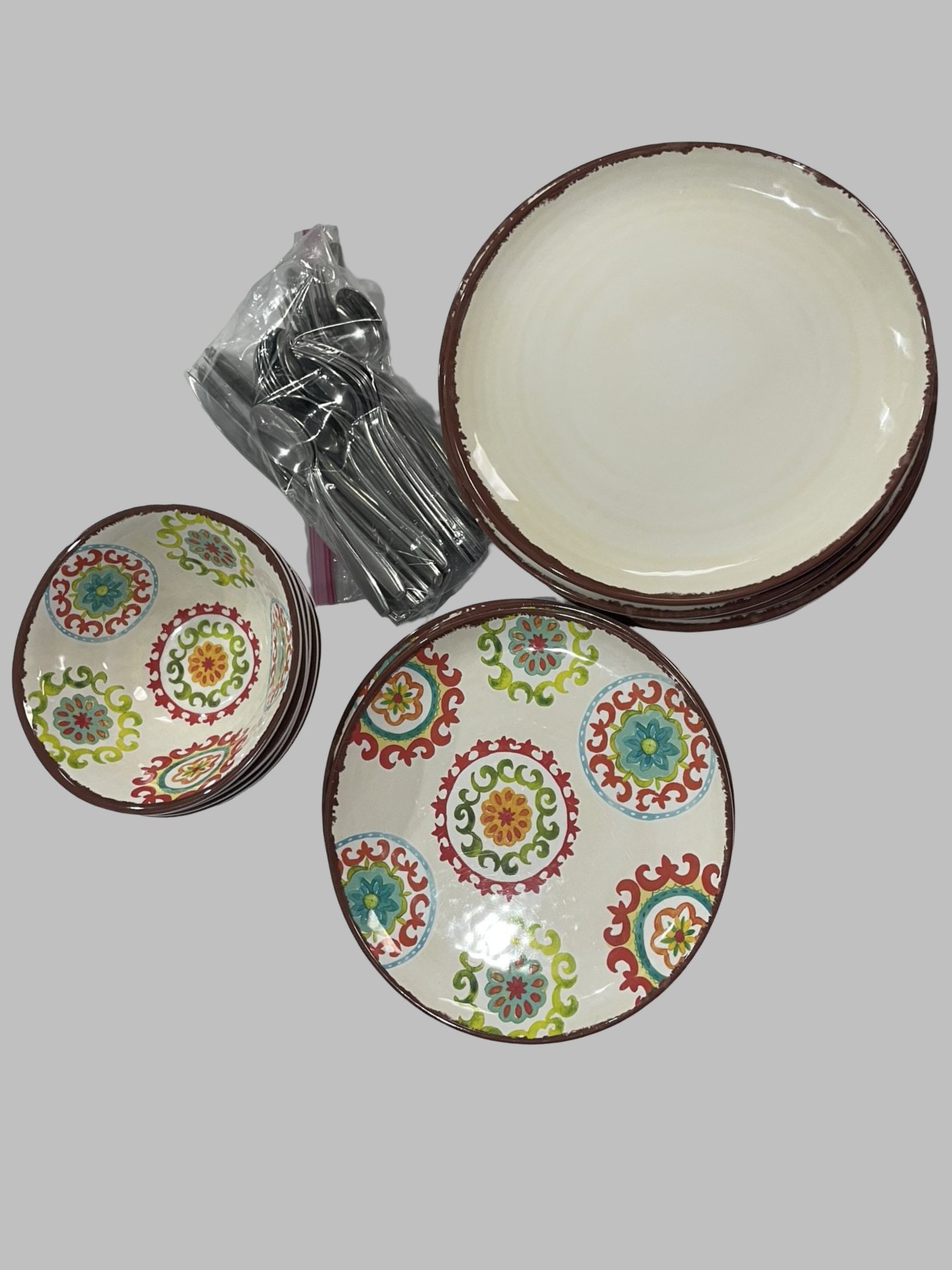Ceramic set, bowls , plates and silverware