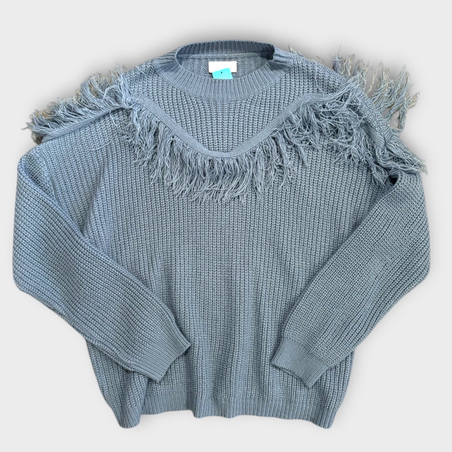 Woman’s large pink lily sweater