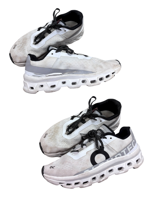 On clouds fits like women’s 8 (flaw on inside of left shoe pictured)
