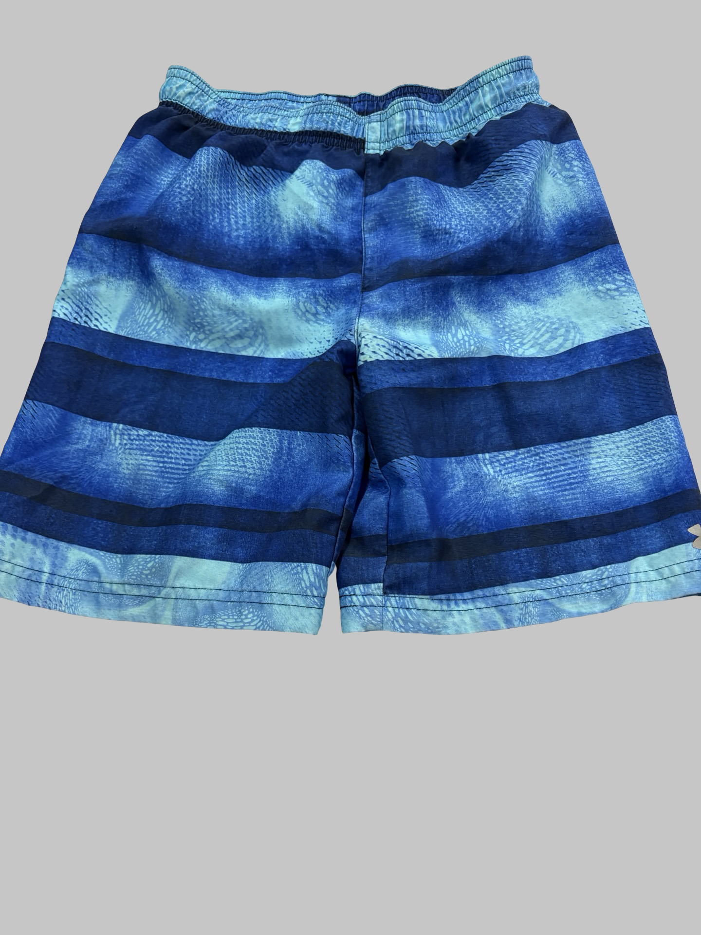 Boys UA swim trunks size 7