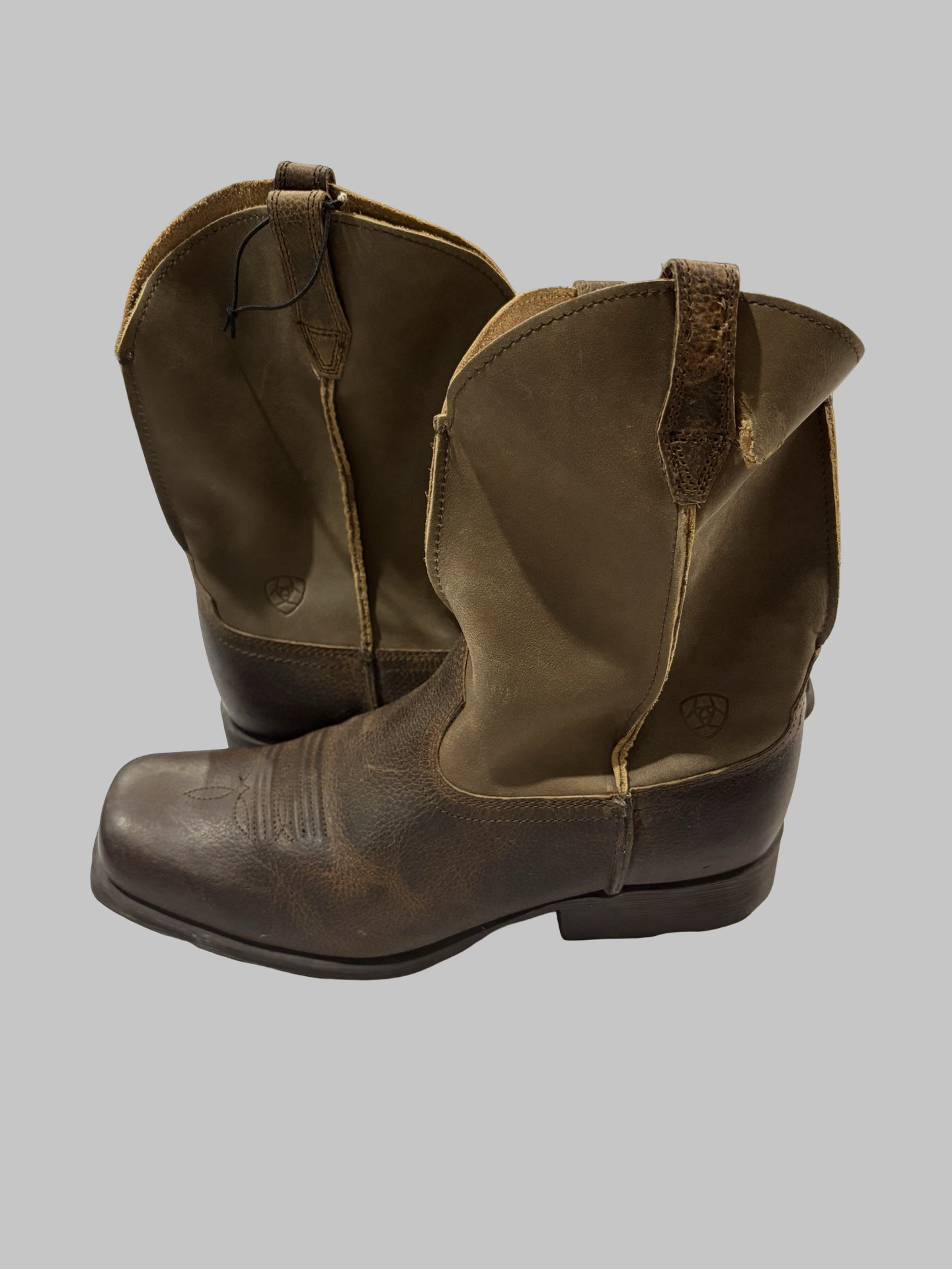 Size 6 Ariat boots new with a small hole