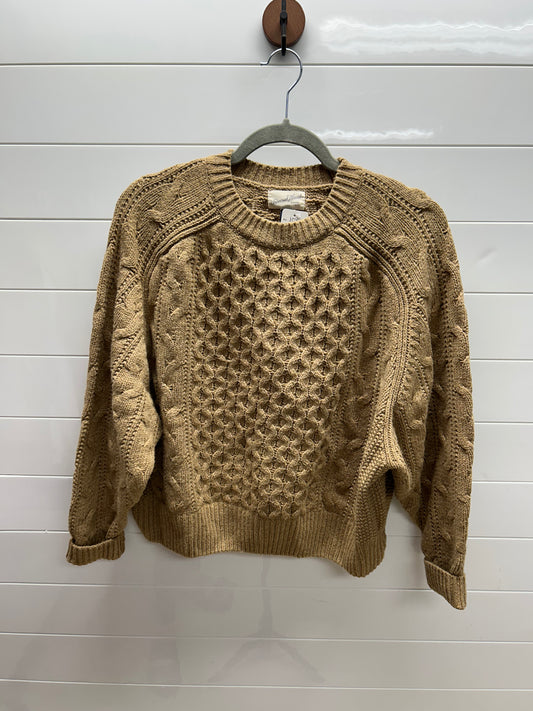 Woman’s small sweater