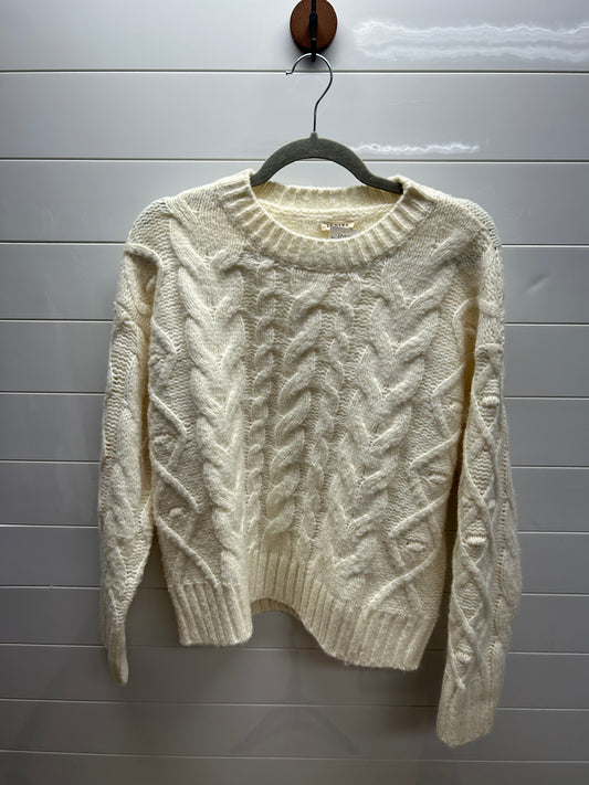 Woman’s small sweater